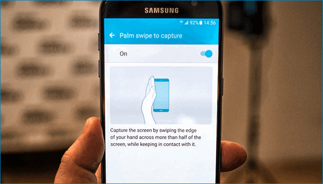 Провести ладонью по экрану Samsung Galaxy J7